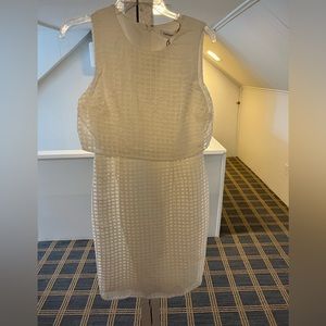 Calvin Klein. White textured dress - top overlays bottom. Size 8.